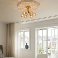 Nuura Apiales 6 taklampe børstet messing / optic gold glass